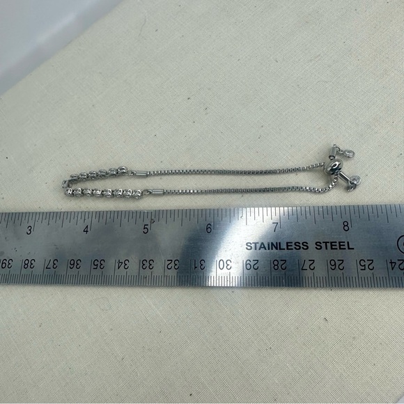 Classic Tennis Silver Tone Adjustable Bracelet with Crystals - Picture 5 of 6